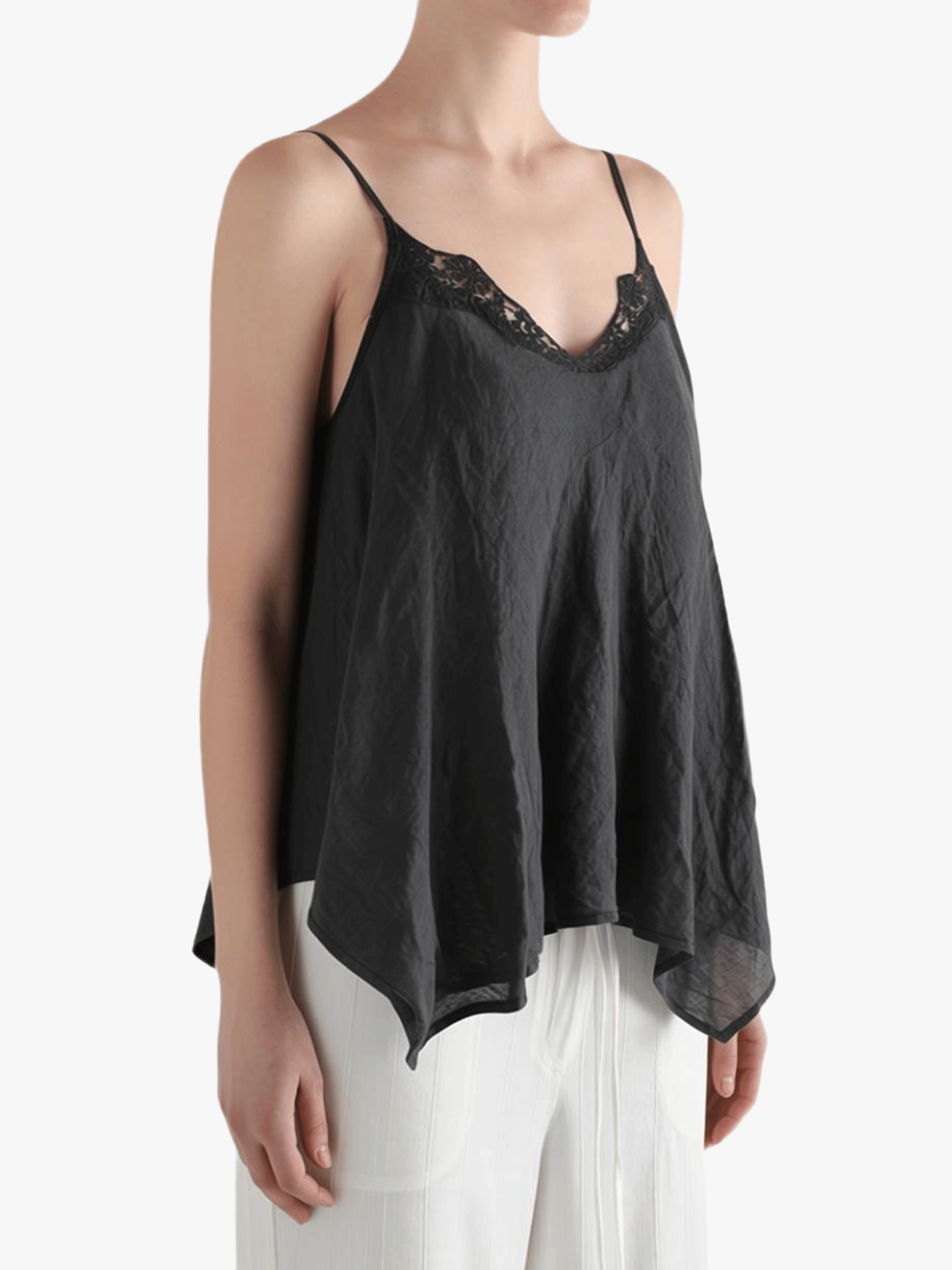 Black top worn by a person, showing the top's fit