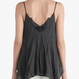 Black top worn by a person, showing the top's fit