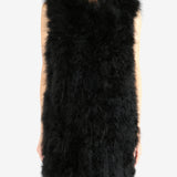 Black gilet worn by a person,showing the gilet's fit