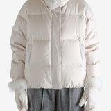 Pink jacket worn by a person, showing the jacket's fit