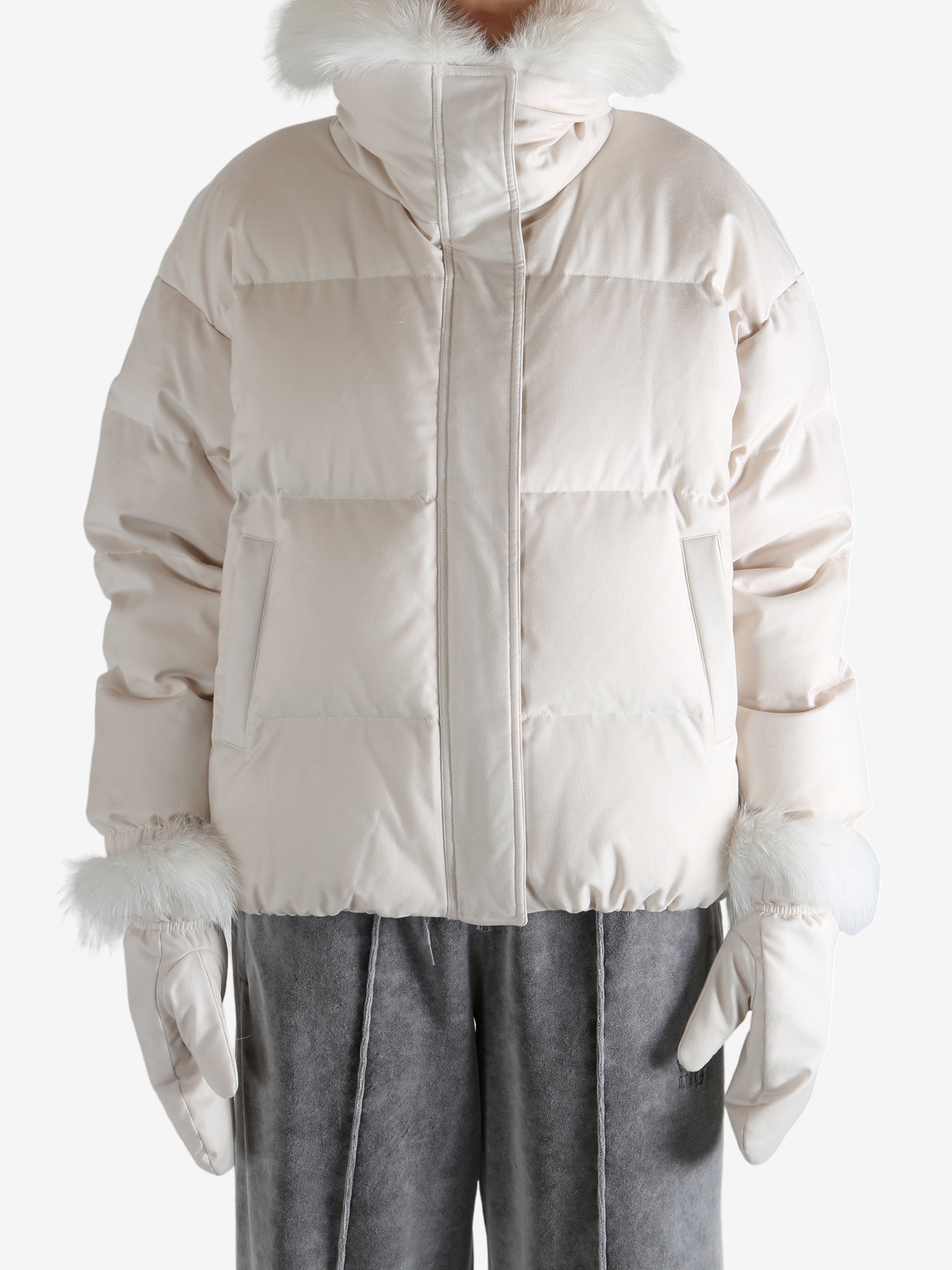 Pink jacket worn by a person, showing the jacket's fit