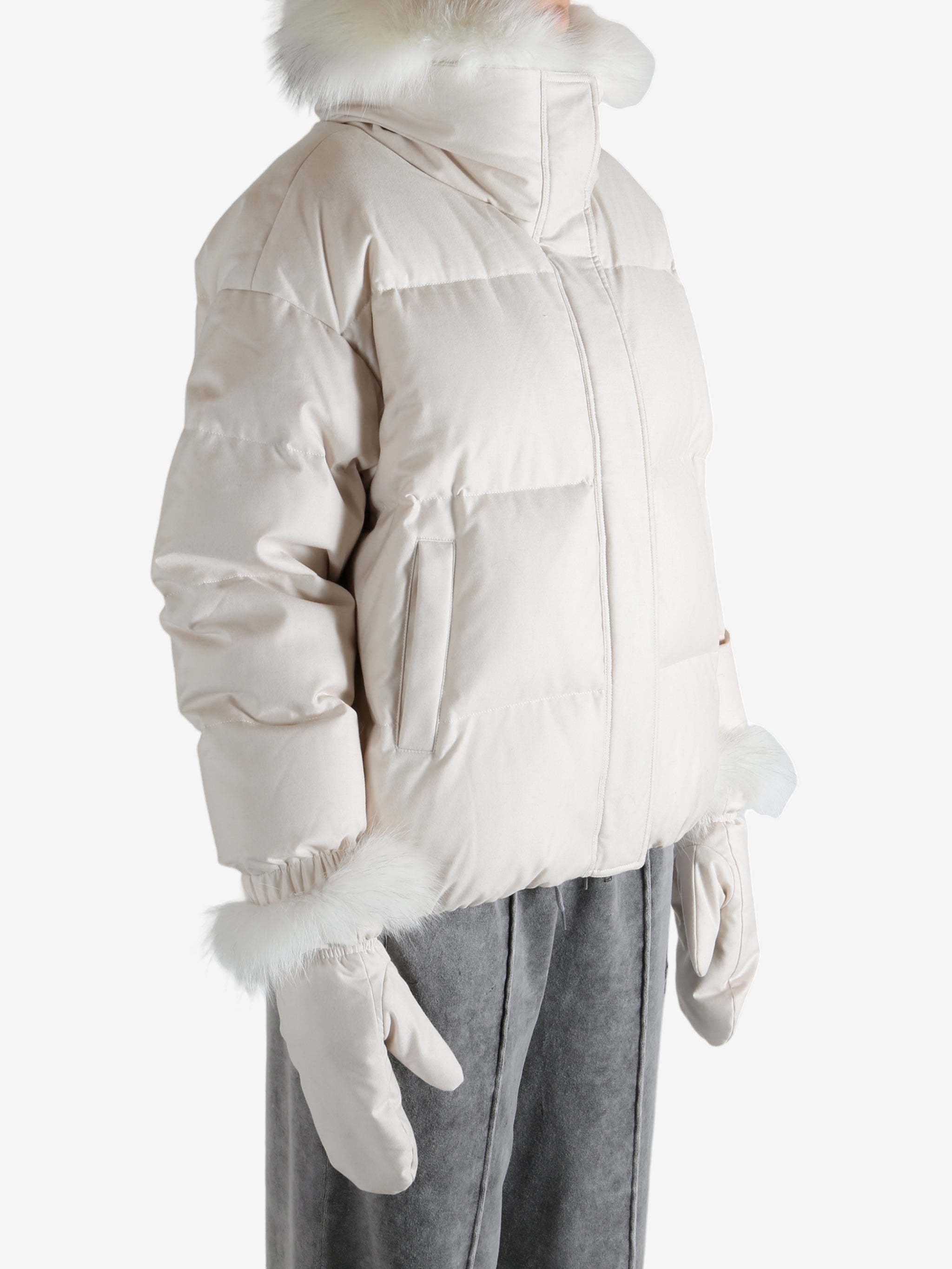 Pink jacket worn by a person, showing the jacket's fit