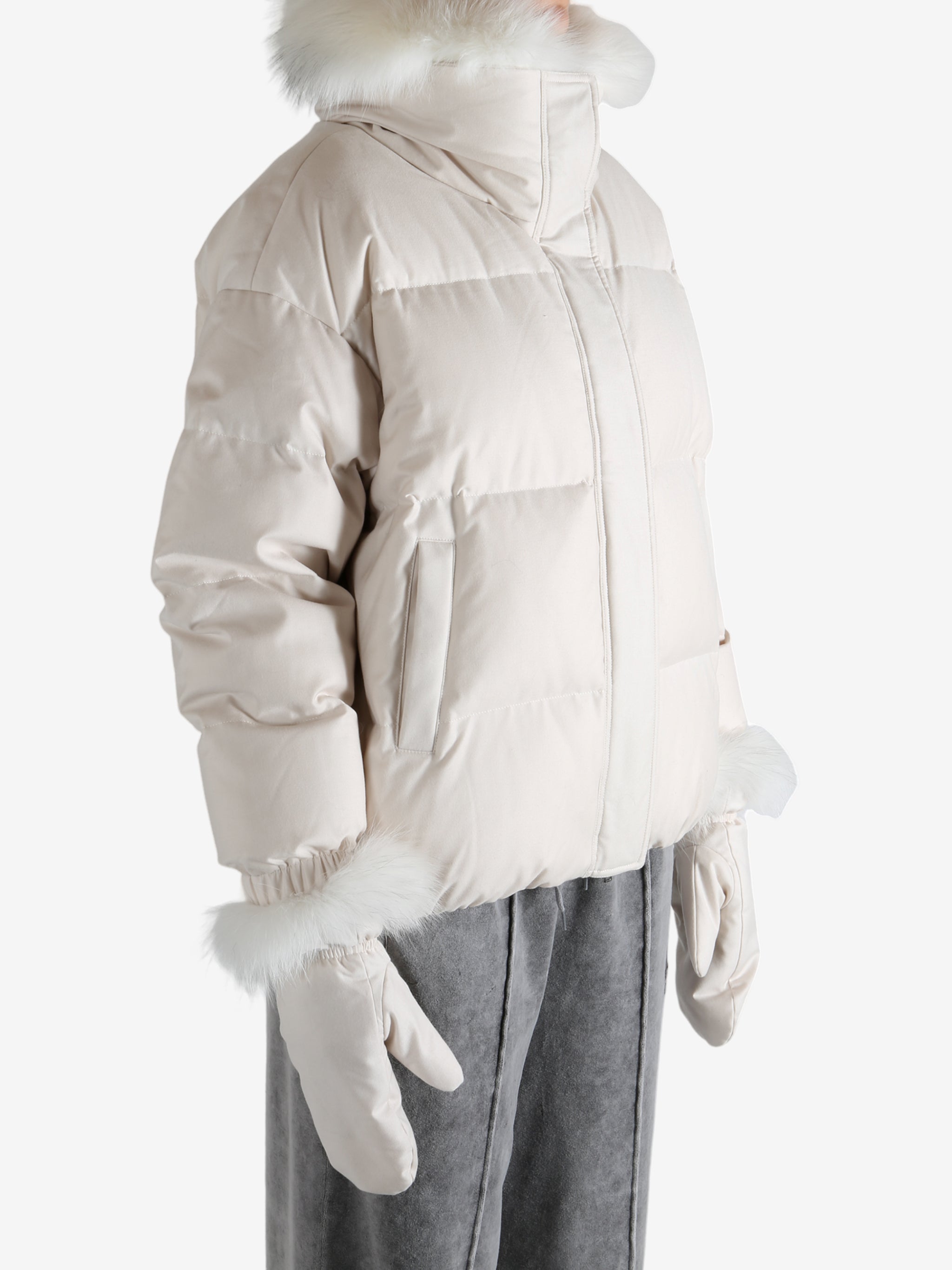 Pink jacket worn by a person, showing the jacket's fit