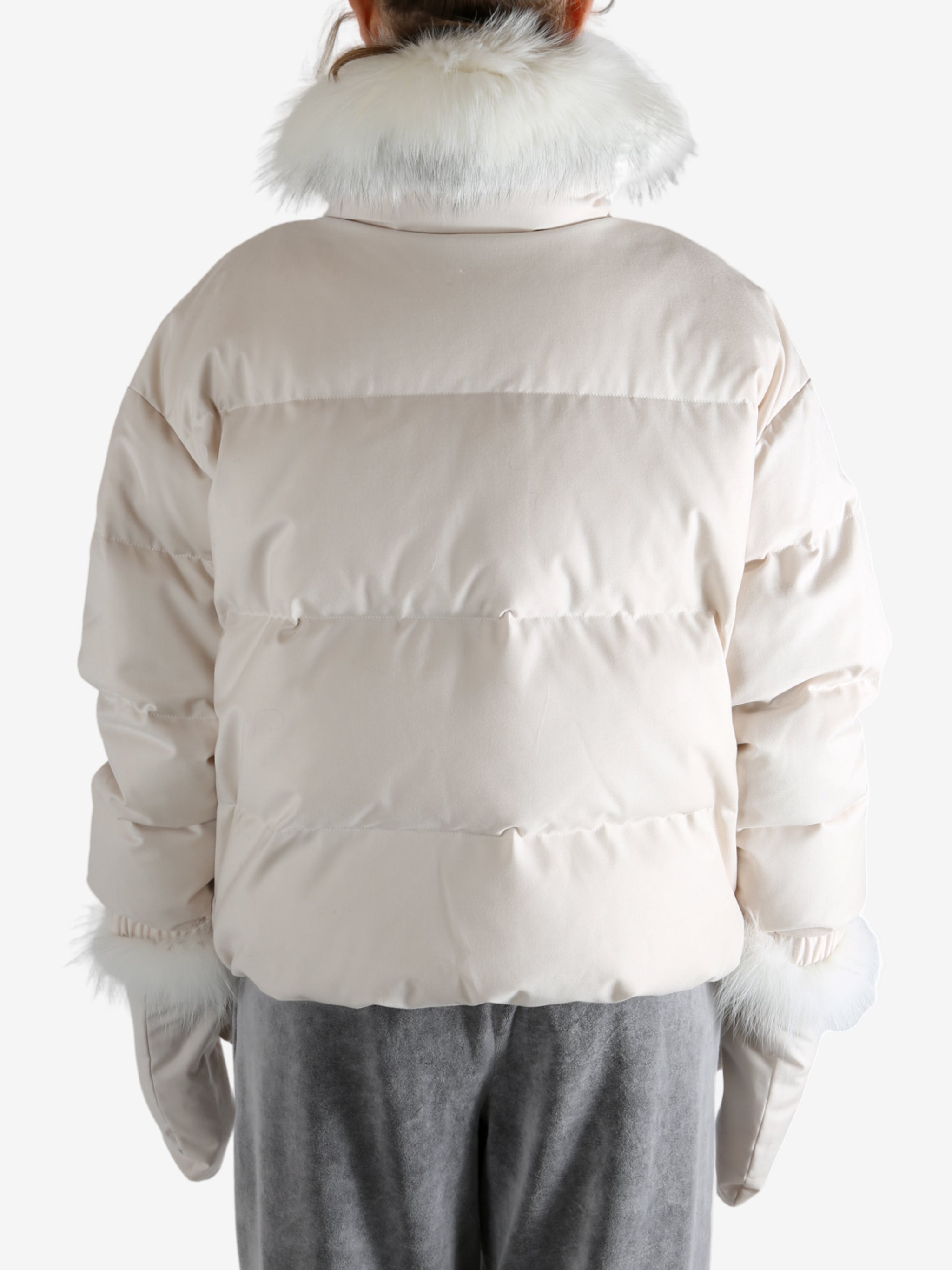 Pink jacket worn by a person, showing the jacket's fit