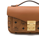 Close up of orange top,showing texture of the cotton fabric.