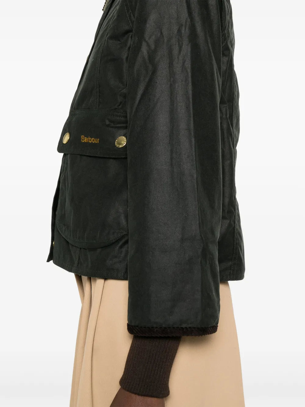 Close up of the black jacket, showing texture of the cotton fabric