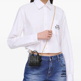 Black bag worn by a person, showing the bag's fit