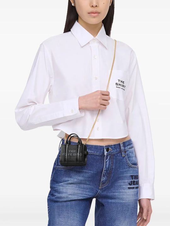 Black bag worn by a person, showing the bag's fit