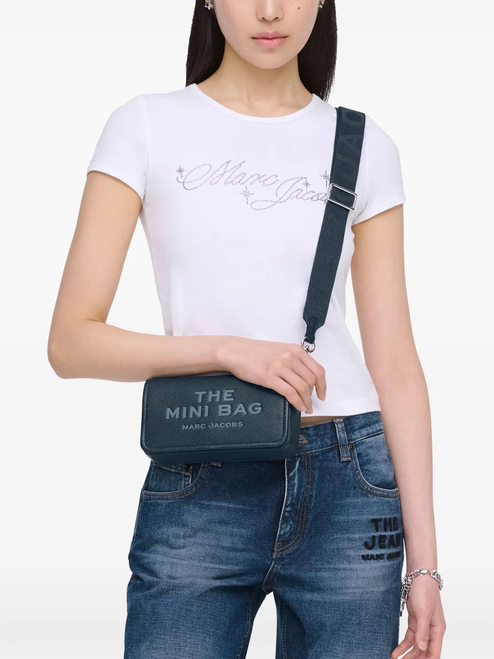 Navy bag worn by a person, showing the bag's fit