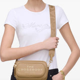 Brown bag worn by a person, showing the bag's fit