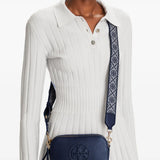 Navy bag worn by a person, showing the bag's fit