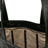 Close up of the green bag, showing texture of the linen/ flax and cotton fabric