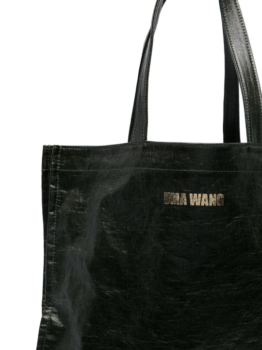 Close up of the green bag, showing texture of the linen/ flax and cotton fabric