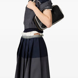 Grey skirt worn by a person, showing the skit's fit