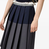 Close up of grey skirt, showing the texture of the mohair fabric