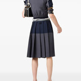 Grey skirt worn by a person, showing the skit's fit