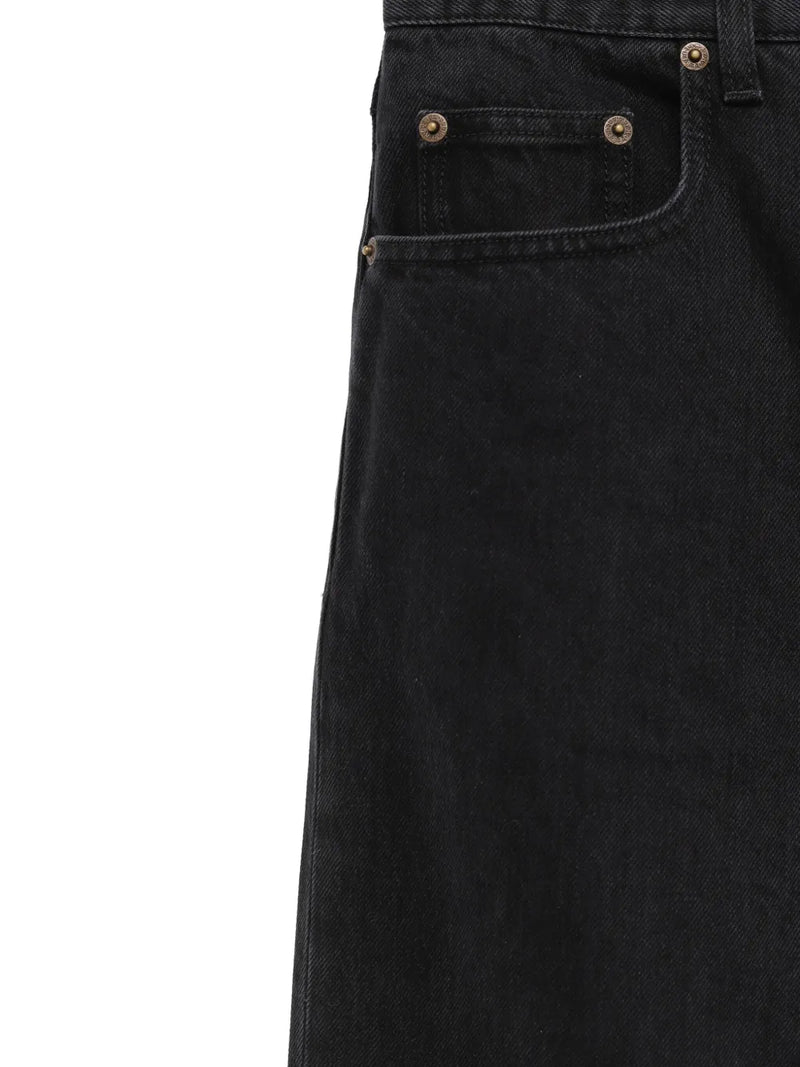 Close up of black Jeans, showing texture of the cotton fabric