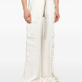 White pant worn by a person, showing the pant’s fit