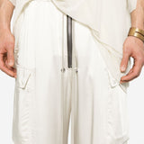 Close up of white pant, showing texture of the acetate and viscose fabric