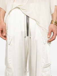 Close up of white pant, showing texture of the acetate and viscose fabric