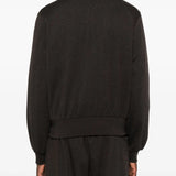 Brown jackets worn by a person, showing the jackets fit