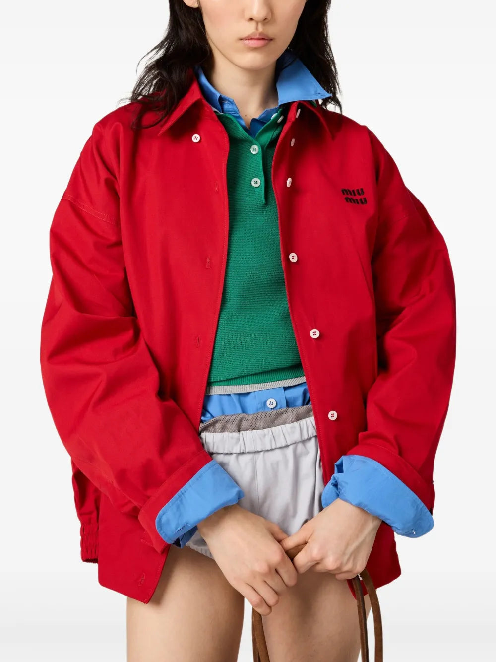 Red jacket worn by a person, showing the jacket's fit