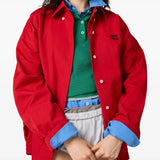 Red jacket worn by a person, showing the jacket's fit
