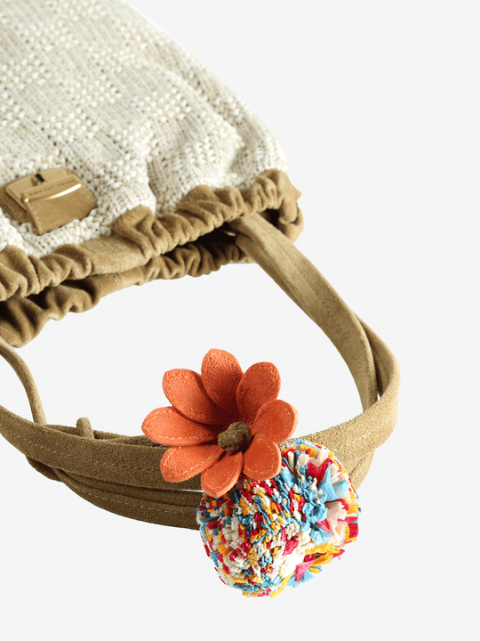 Close up of tan bag, showing texture of the Polyethylene fabric