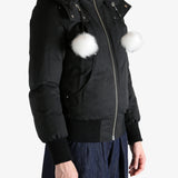 Black jacket worn by a person, showing the jacket's fit