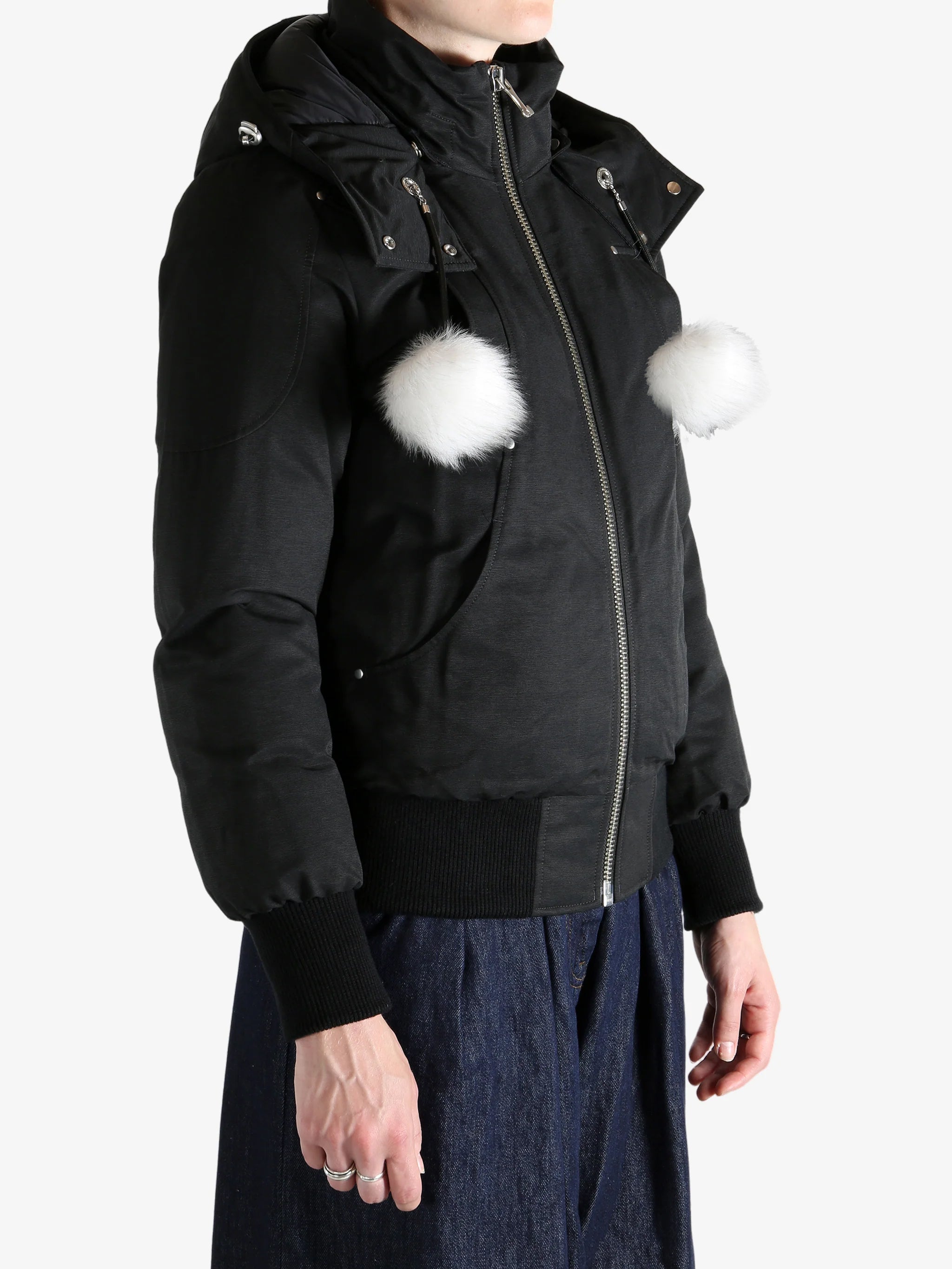 Black jacket worn by a person, showing the jacket's fit