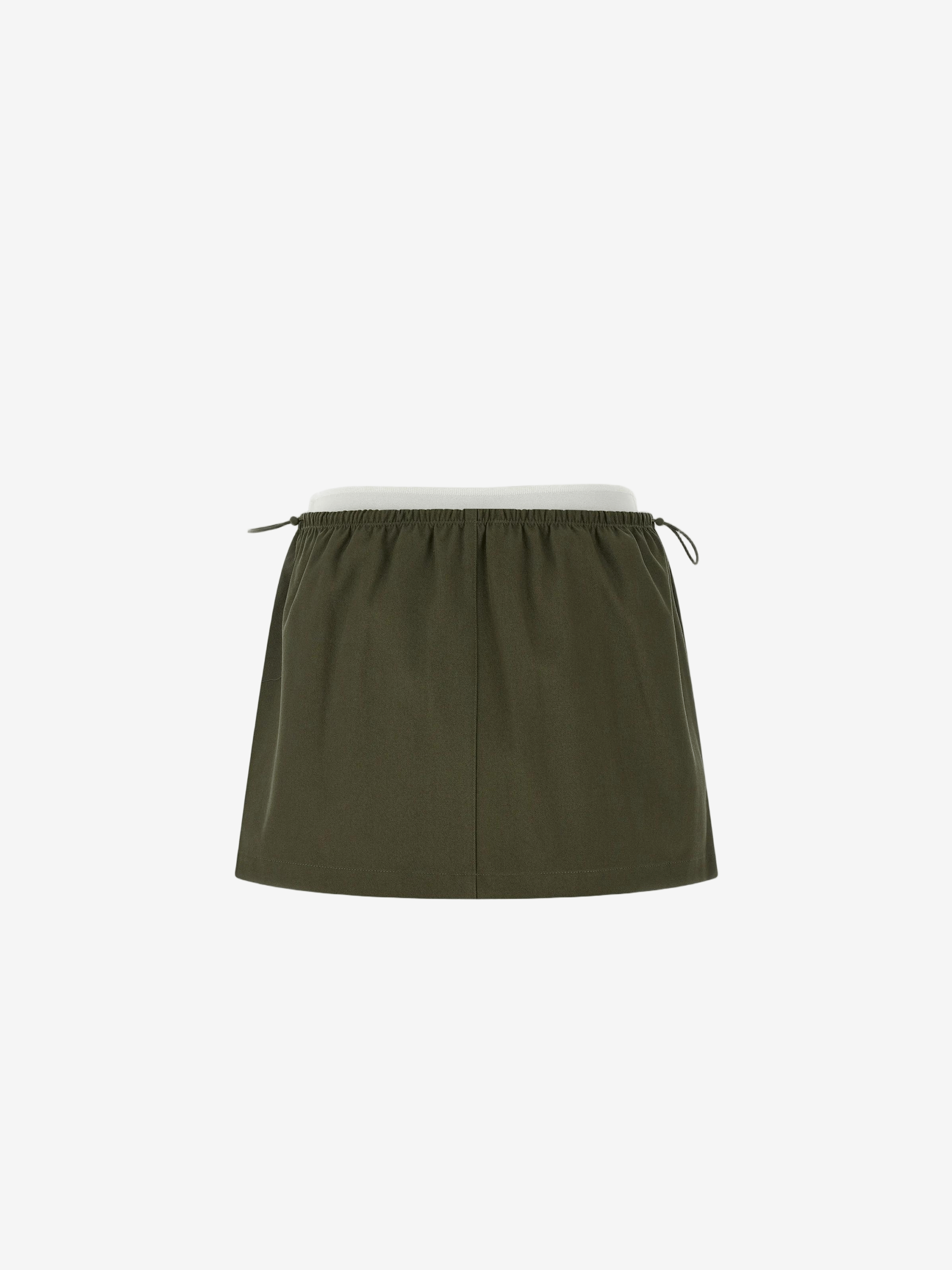 green skirts, front view