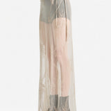 tan skirt worn by a person, showing the skirt  fit
