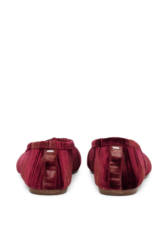 Red shoes, back view