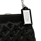 Close up of the black bag, showing texture of the polyamide fabric