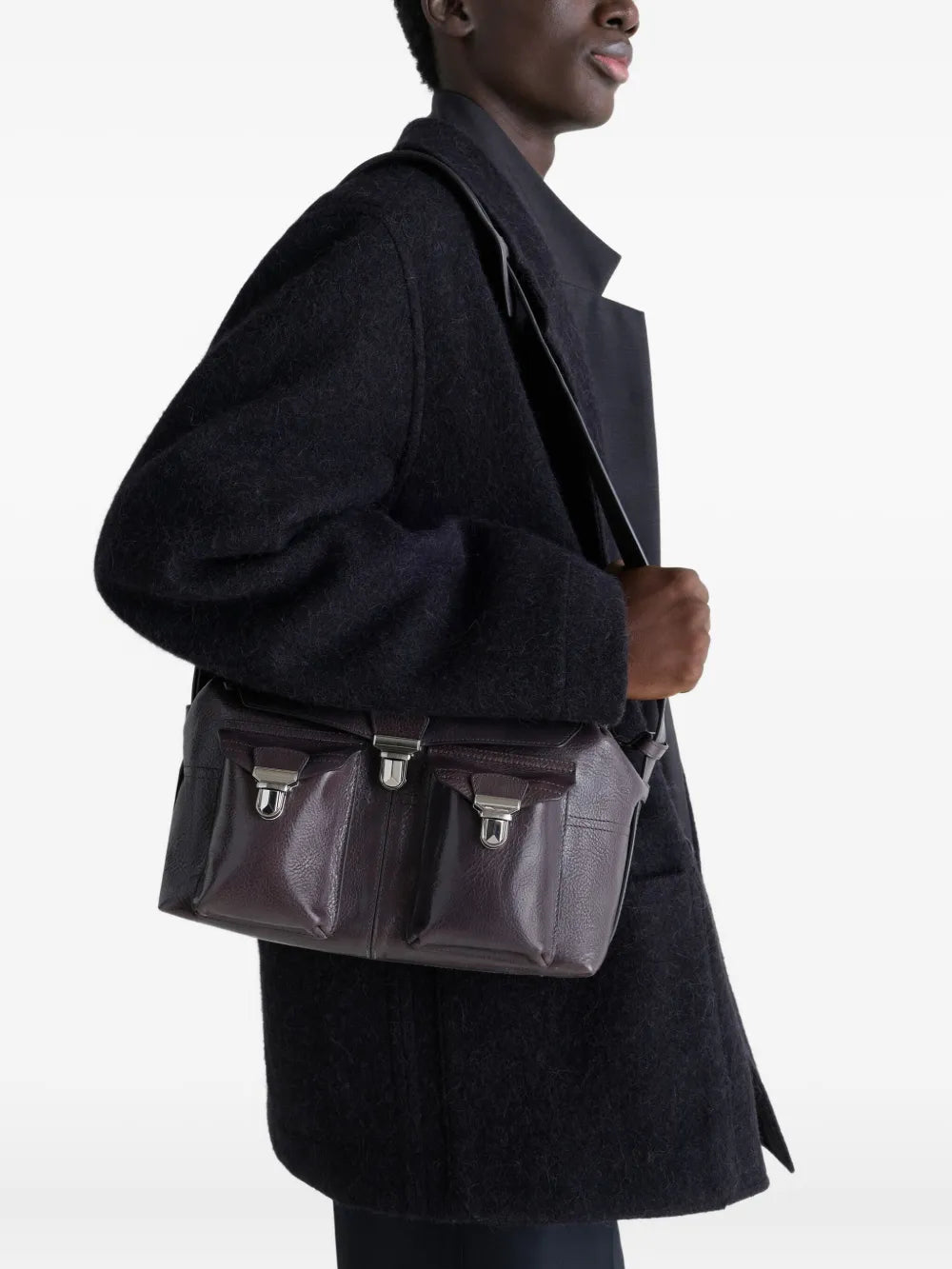 Purple bag worn by a person, showing the bag's fit