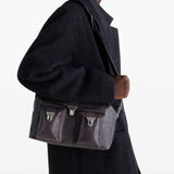 Purple bag worn by a person, showing the bag's fit