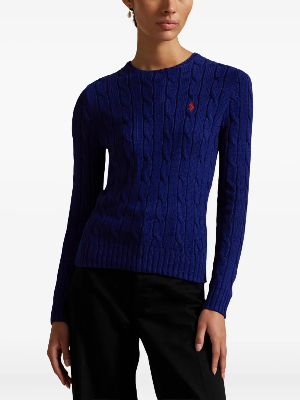 Blue pullover worn by a person, showing the pullover's fit