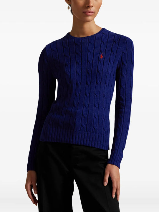 Blue pullover worn by a person, showing the pullover's fit