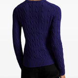 Blue pullover worn by a person, showing the pullover's fit