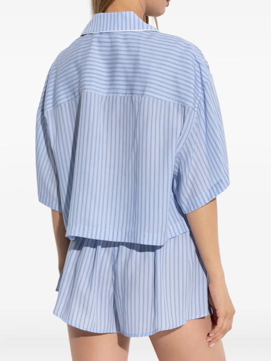 Blue shorts worn by a person, showing the shorts's fit