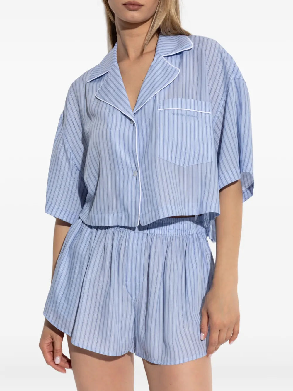 Blue shorts worn by a person, showing the shorts's fit