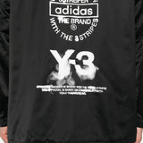 Close up of black jacket,showing texture of the recycled polyacrylic fabric.