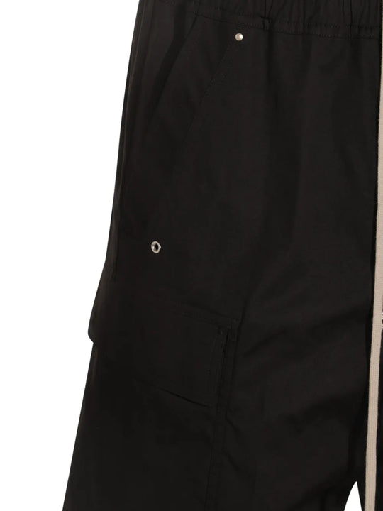 Close up of the black pant, showing texture of the cotton fabric