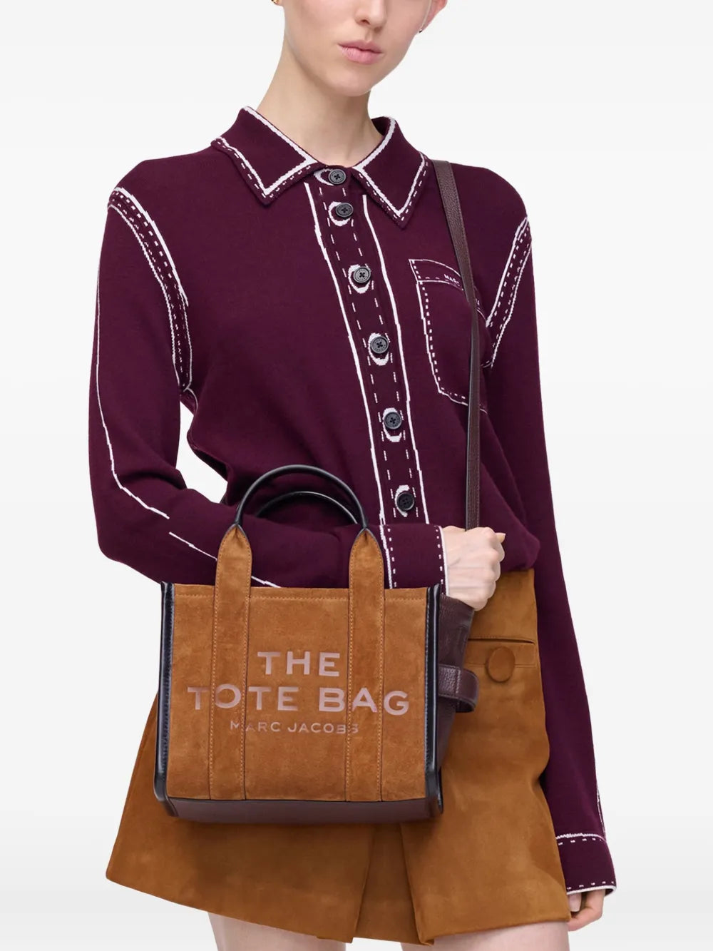 Brown bag worn by a person, showing the bag's fit