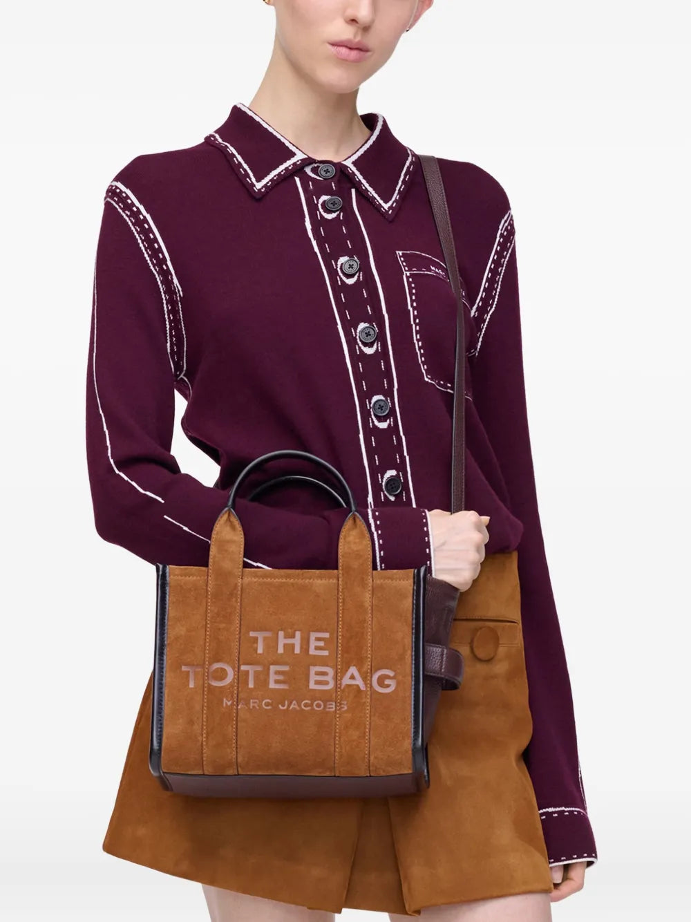 Brown bag worn by a person, showing the bag's fit