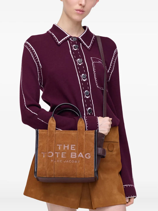 Brown bag worn by a person, showing the bag's fit