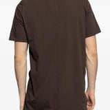 Brown t-shirt worn by a person, showing the shirt's fit