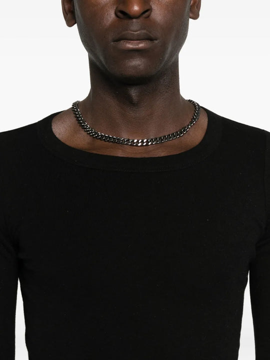 Close up of the black top, showing texture of the cotton fabric