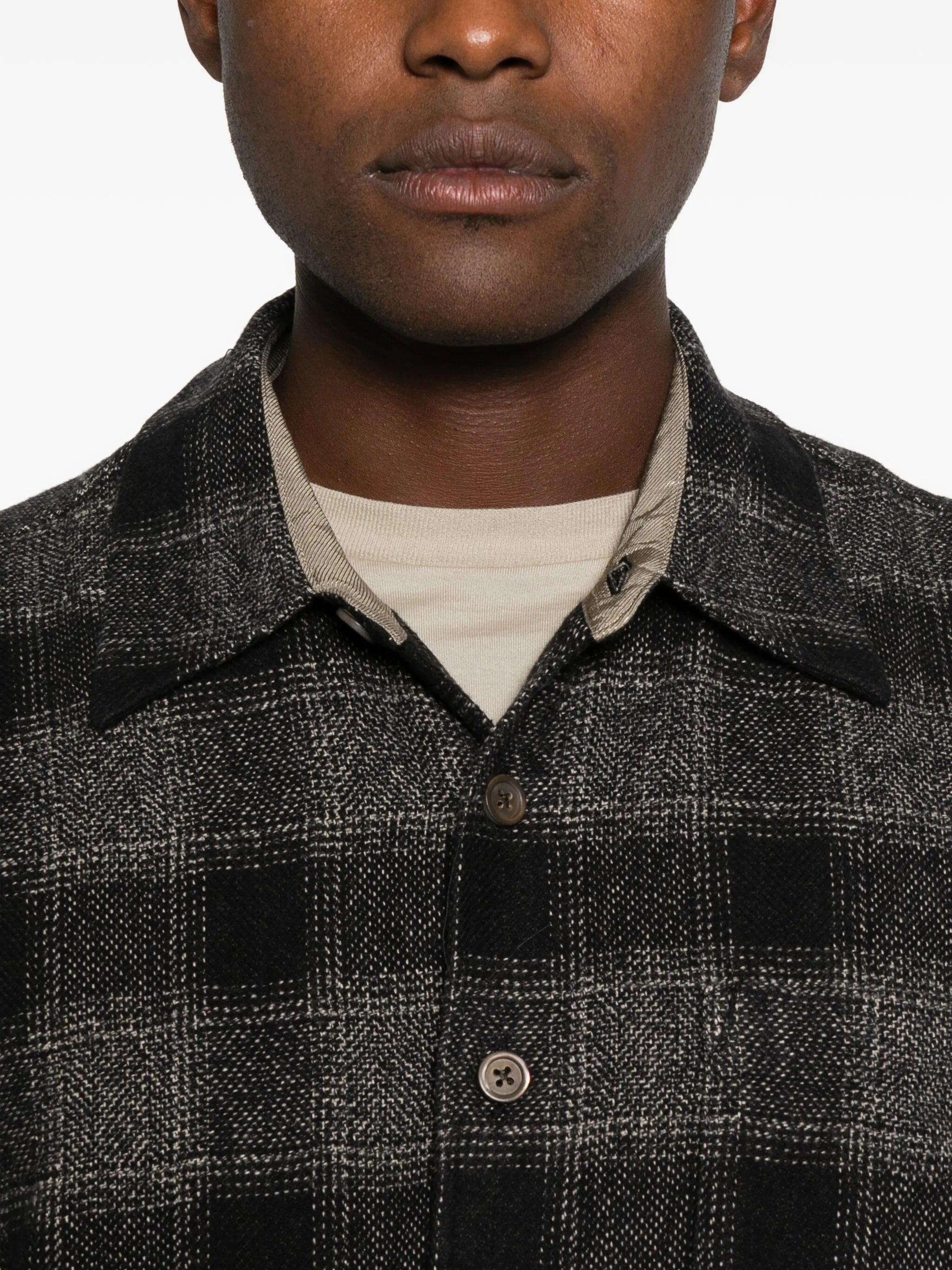 Close up of grey shirt, showing texture of the cotton fabric