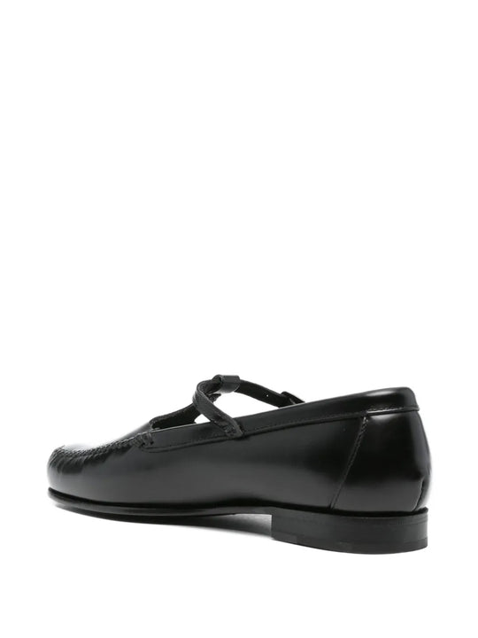 Black loafer, back view